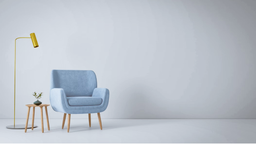 Ein Foto einem blauen Stuhl in einem Zimmer, das die Kostenerstattung von Psychotherapie von der Privatarzt-Versicherung symbolisiert.